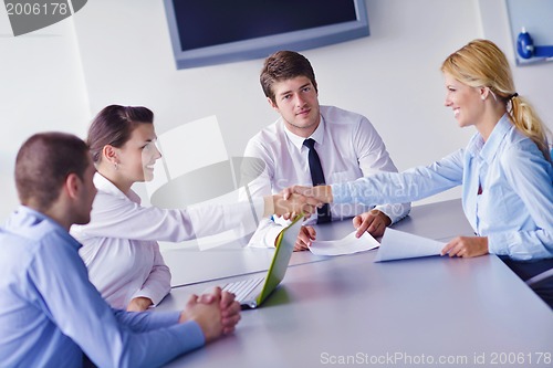 Image of business people in a meeting at office