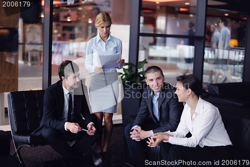 Image of business people making deal