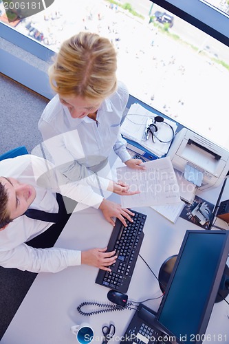 Image of business people in a meeting at office