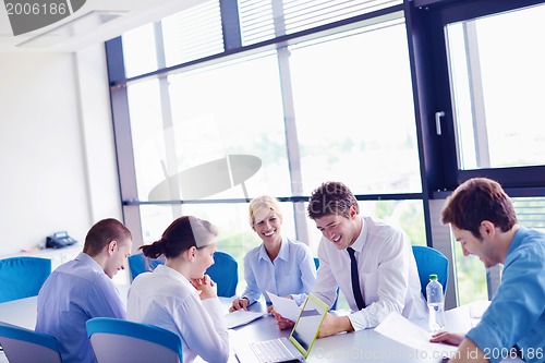 Image of business people in a meeting at office
