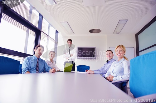 Image of business people in a meeting at office