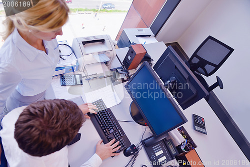 Image of business people in a meeting at office
