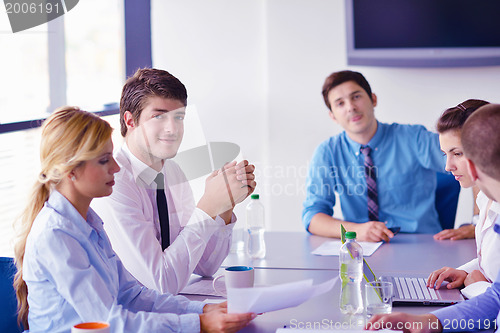 Image of business people in a meeting at office