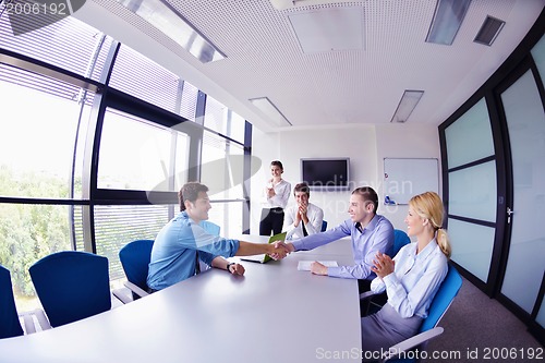 Image of business people in a meeting at office