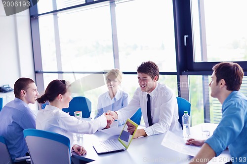 Image of business people in a meeting at office