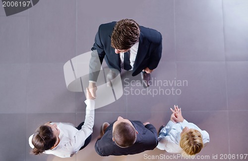 Image of business people making deal