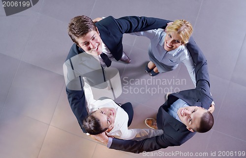 Image of business people group joining hands