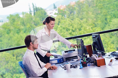 Image of business people in a meeting at office
