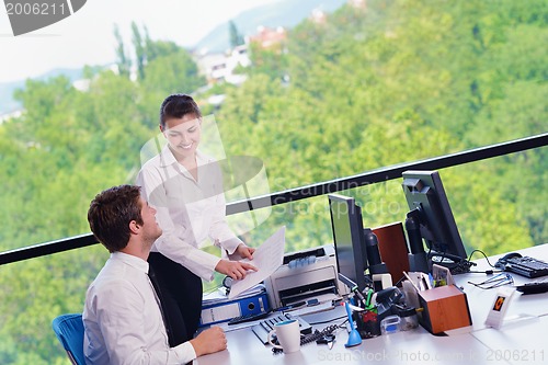 Image of business people in a meeting at office