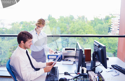 Image of business people in a meeting at office