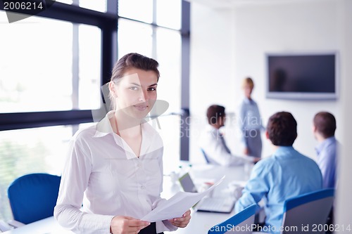 Image of business people in a meeting at office