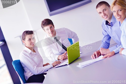 Image of business people in a meeting at office