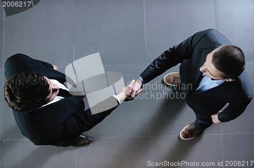Image of business people making deal