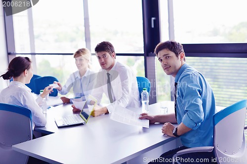 Image of business people in a meeting at office