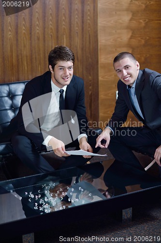 Image of business people making deal