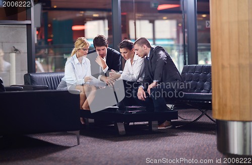 Image of business people making deal