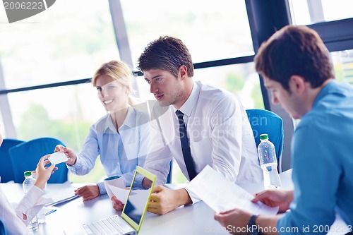 Image of business people in a meeting at office