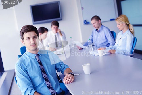 Image of business people in a meeting at office