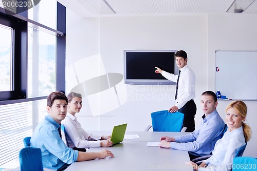 Image of business people in a meeting at office