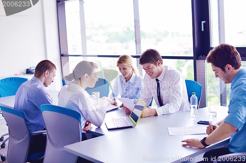 Image of business people in a meeting at office