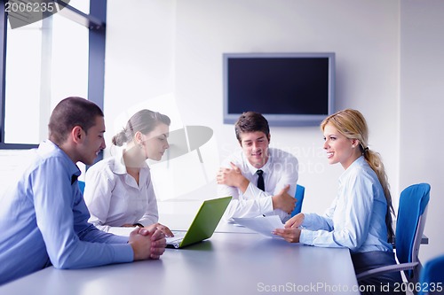 Image of business people in a meeting at office