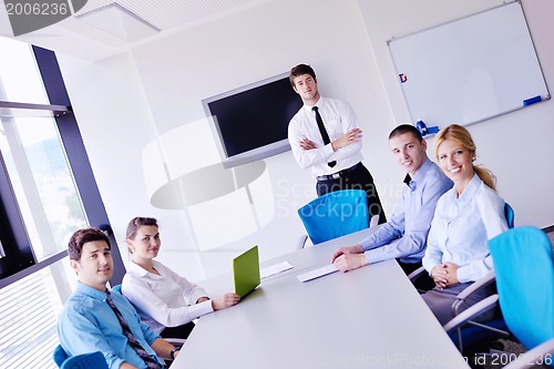 Image of business people in a meeting at office