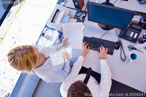 Image of business people in a meeting at office