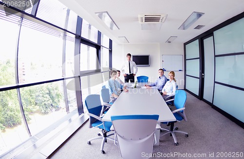 Image of business people in a meeting at office