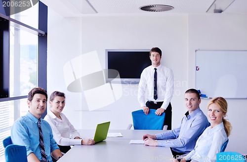 Image of business people in a meeting at office