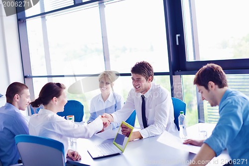 Image of business people in a meeting at office