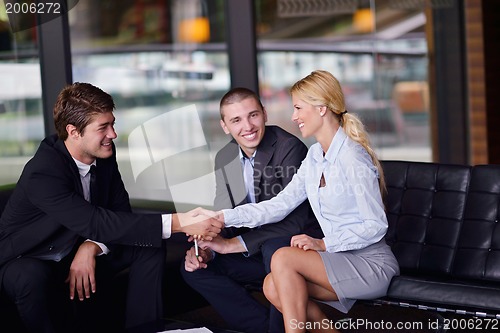 Image of business people making deal