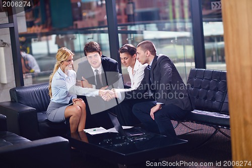 Image of business people making deal