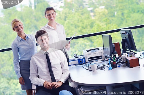 Image of business people in a meeting at office