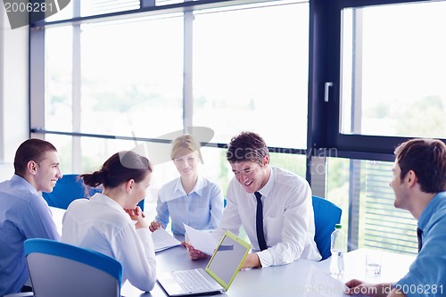 Image of business people in a meeting at office