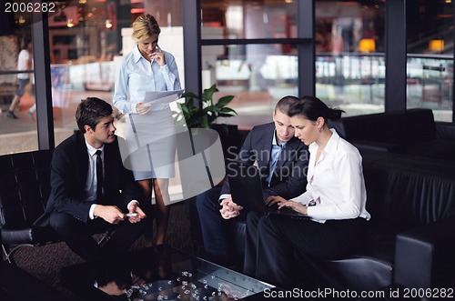 Image of business people making deal