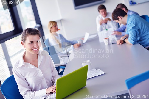 Image of business people in a meeting at office