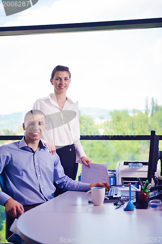 Image of business people in a meeting at office