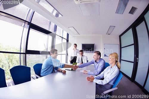 Image of business people in a meeting at office