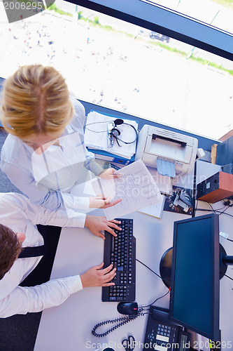 Image of business people in a meeting at office