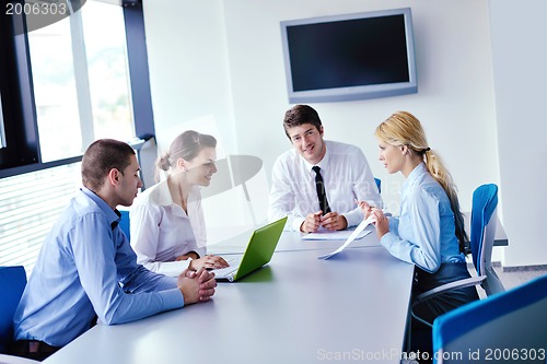 Image of business people in a meeting at office