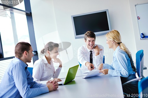 Image of business people in a meeting at office