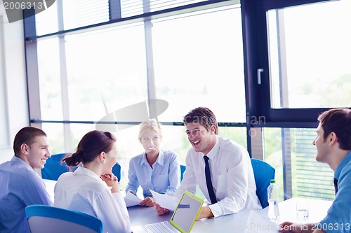 Image of business people in a meeting at office