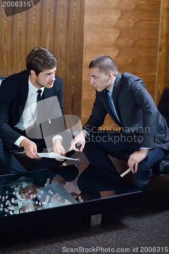 Image of business people making deal