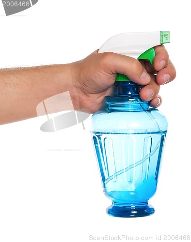 Image of Hand with spray bottle