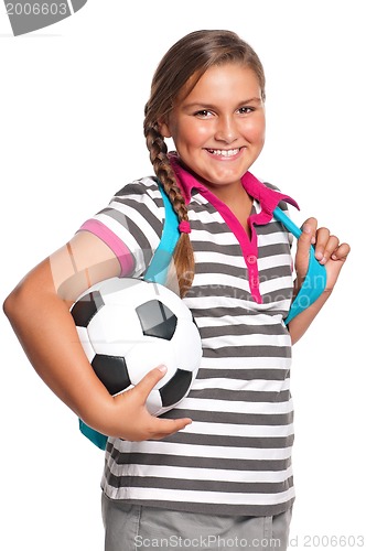 Image of Schoolgirl with soccer ball