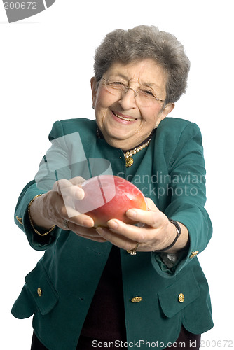 Image of senior woman with mango