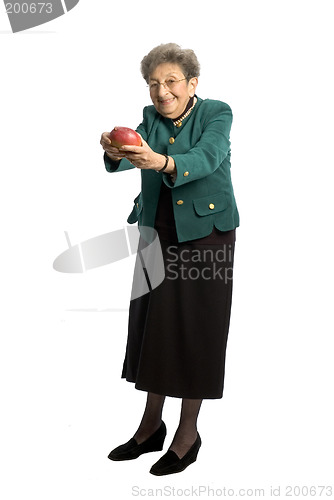 Image of senior woman with mango