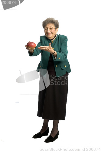 Image of senior woman with mango