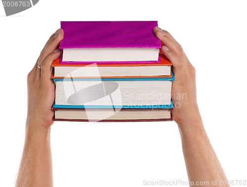 Image of Man hand with books