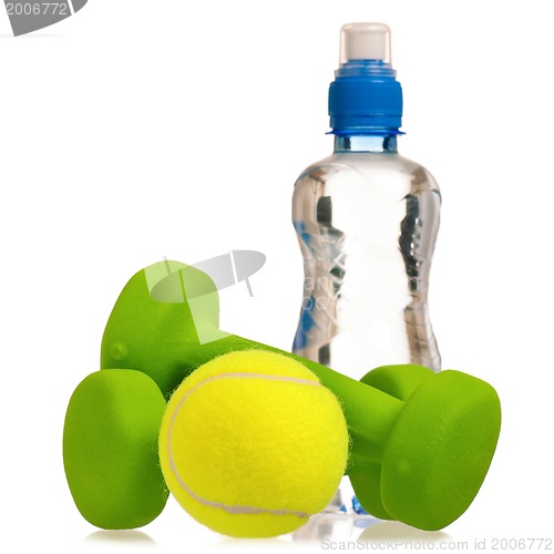 Image of Tennis ball with dumbbells and water